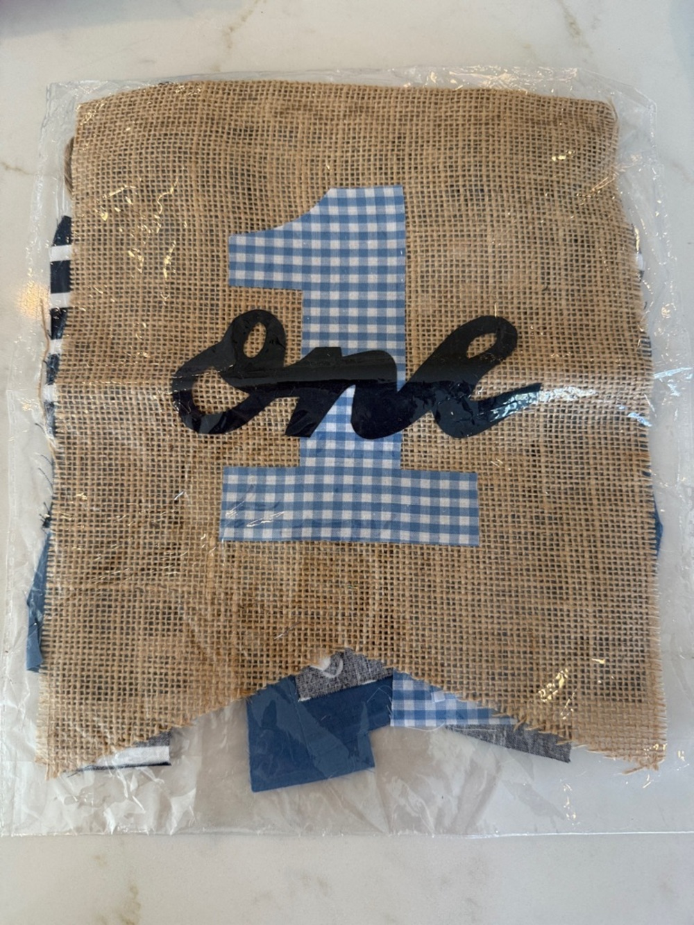 First Birthday Banner in original packaging